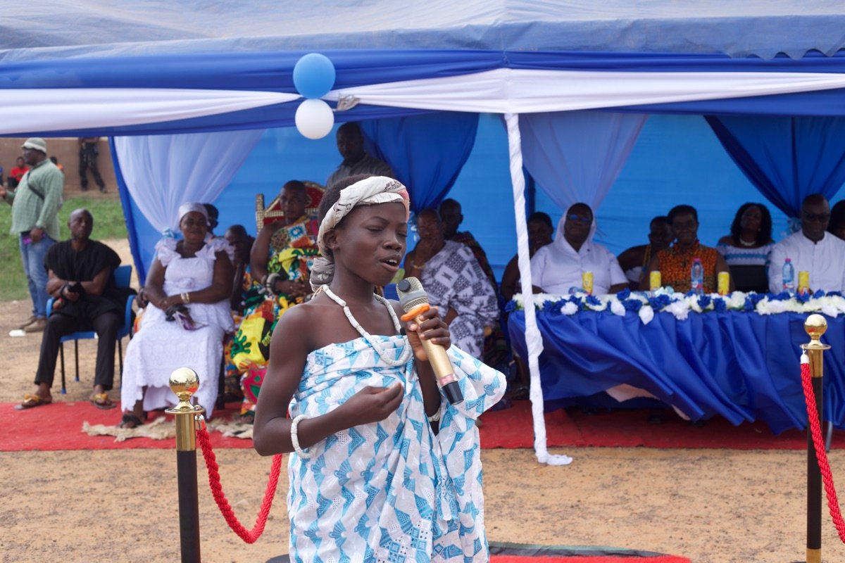 Young girl performing at the ceremony